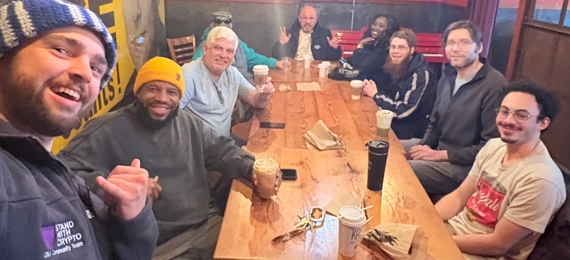 Alaska Crypto Club community gathered around a table at Crypto 'N Coffee, Kaladi Brothers, Anchorage